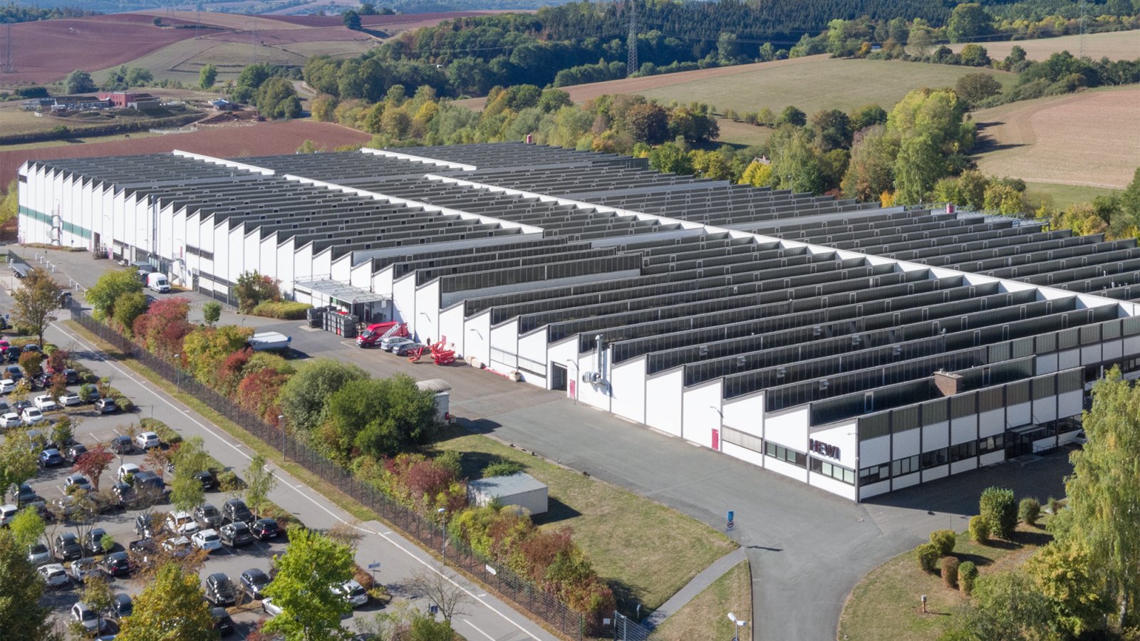 Drone image of the HEWI plant with white facade